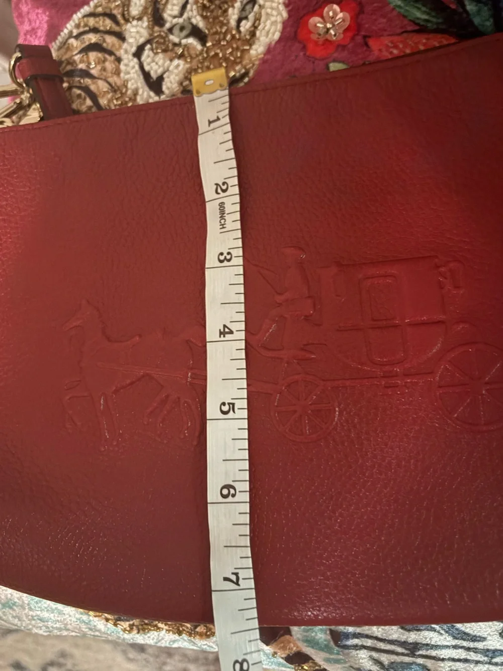 Coach embossed horse & carriage Pebbled Leather Charley pochette or Crossbody